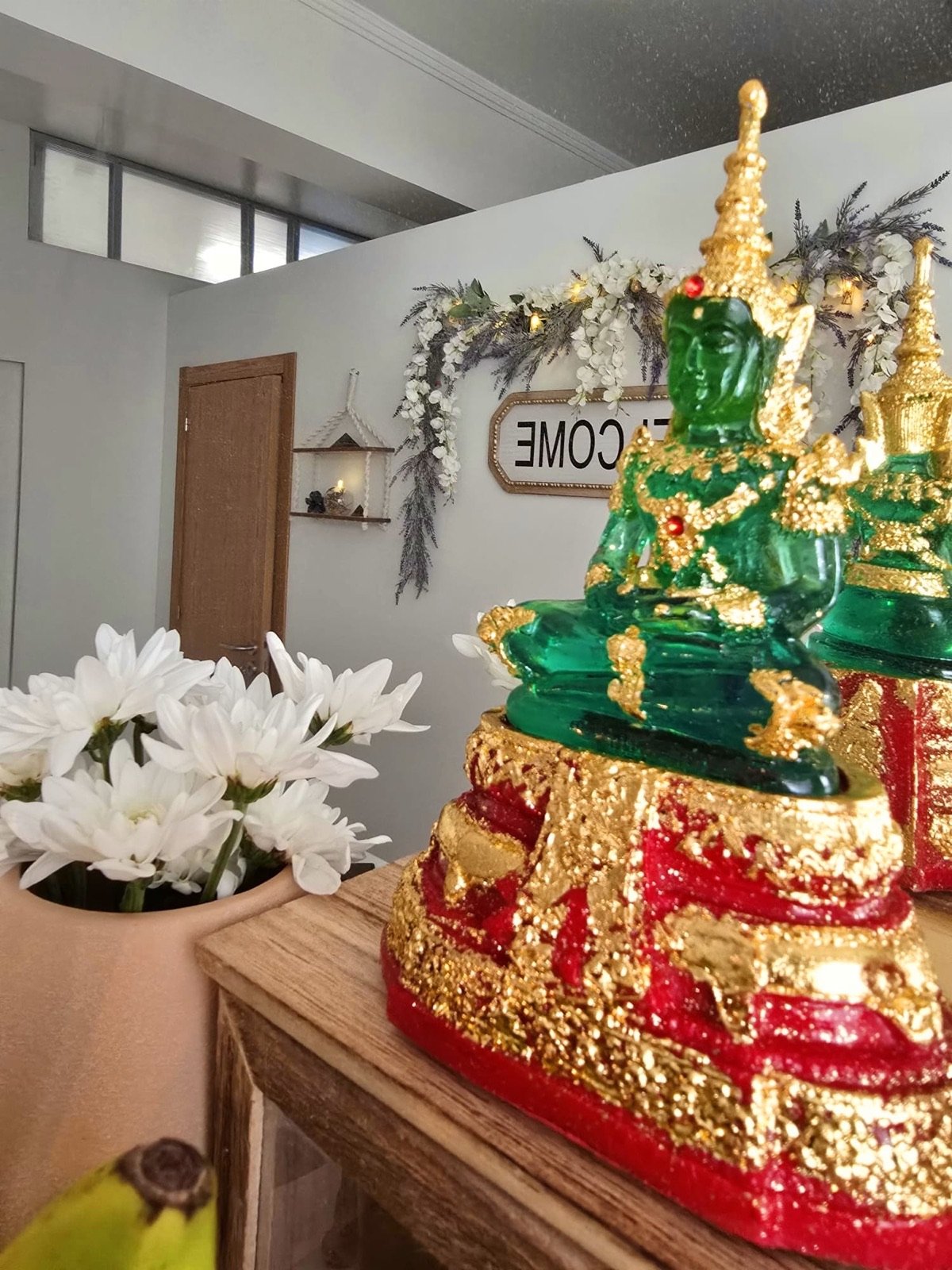 Receção da Good Massage com Buda de Esmeralda